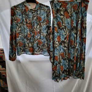 Jones New York Country. Multicolored top and wrap around skirt. Size: 14